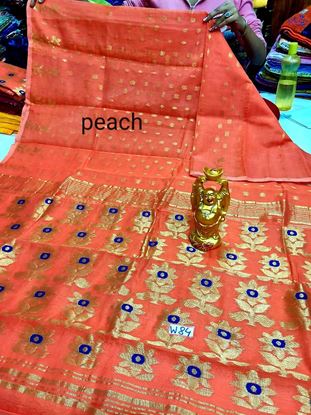 Picture of vihan soft dhakai peach orange colour sari