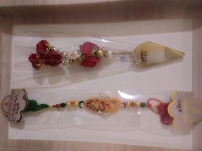 Picture of Rakhi for brother and  lumba for bhabhi with 1 Tika roli